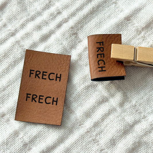 Label zum Einnähen "frech"