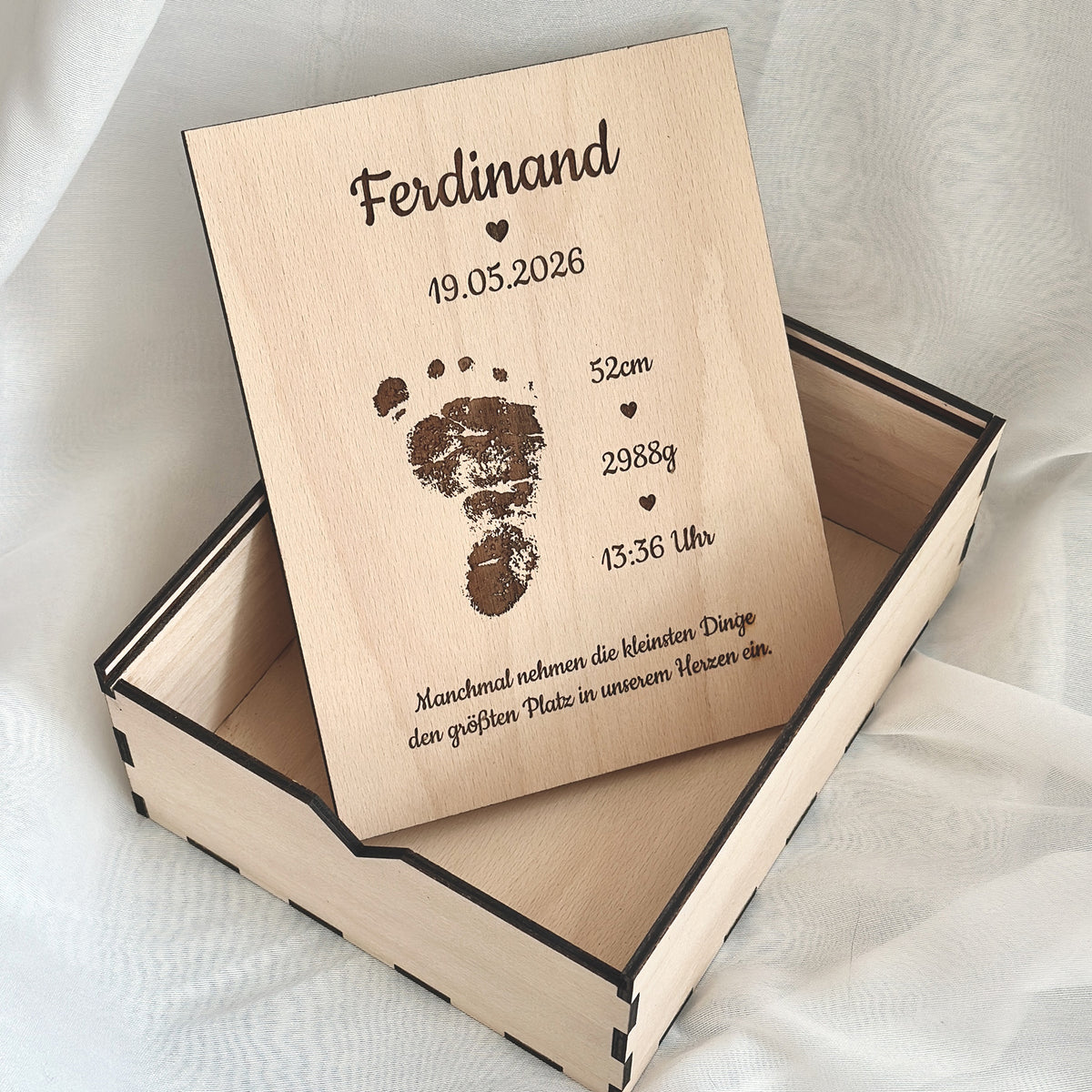 Geburtsbox mit Fußabdruck